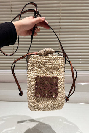 Loewe-style Paula's Ibiza Anagram Bucket Bag & Corn Husk Handwoven Clutch