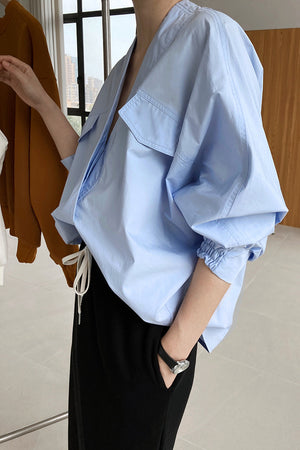 Pleated-cuff Bat-sleeve V-neck Shirt